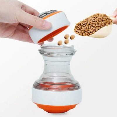 distributeur de croquettes pour chien tournicroq orange remplissage croquettes